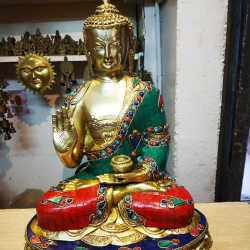 Buddha Brass Statue with Stonework